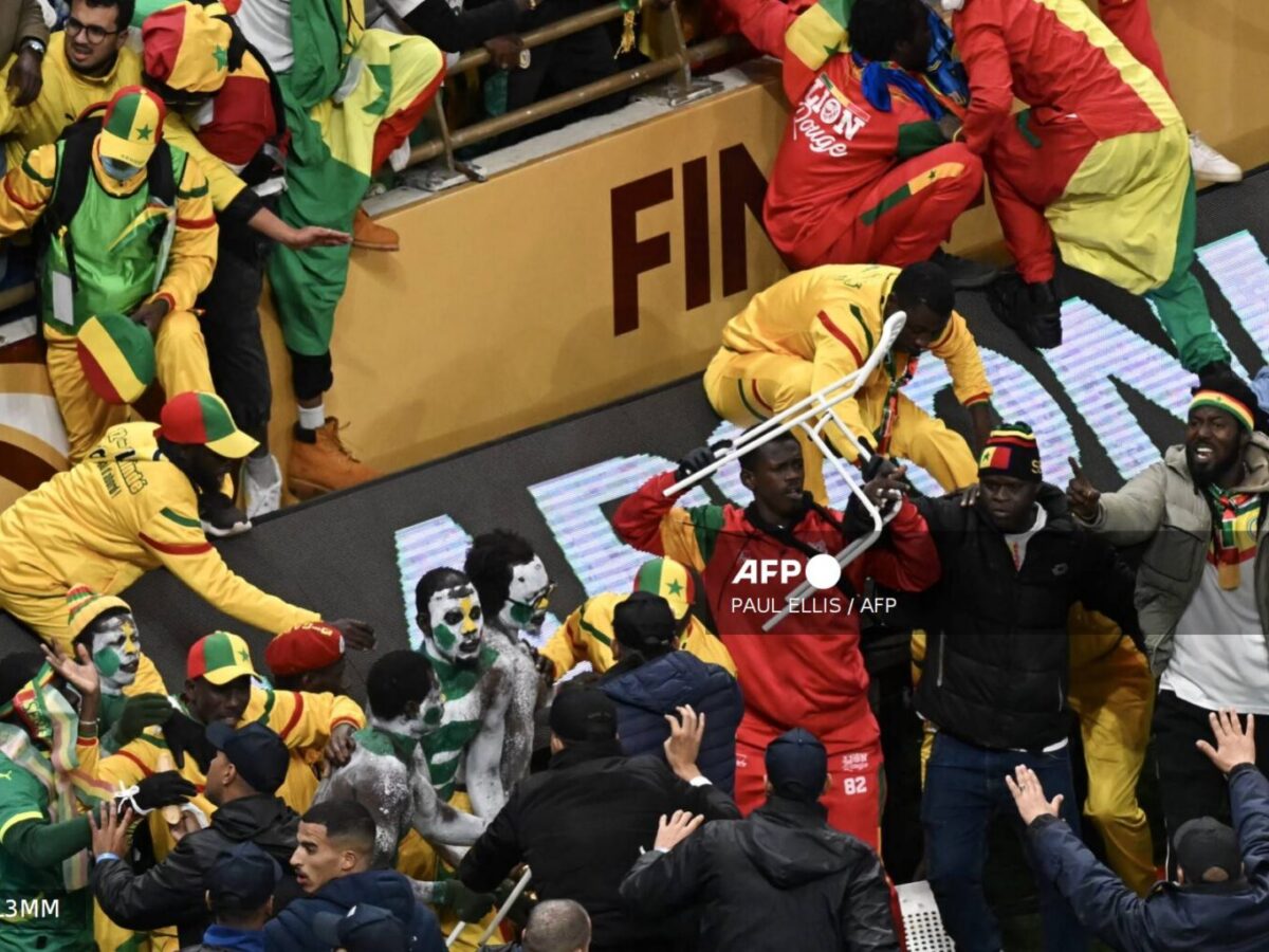 Senegal supporters clash during the Africa Cup of Nations (CAN) final football match between Senegal and Morocco at the Prince Moulay Abdellah Stadium in Rabat on January 18, 2026. (Photo by Paul ELLIS / AFP)